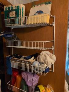 lot 3125 image: White Wire Over Door Storage Rack with contents - boys room on closet door