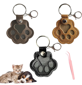 lot 70006 image: 3 Pack Pet Paw Shaped Leather Keychain - Retail $7