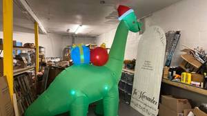Christmas Inflatable Dinosaur with Gift - Retail: $89