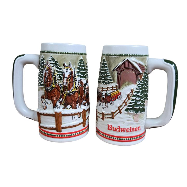 lot 43 image: Pair of Budweiser Clydesdales Holiday Beer Stein
