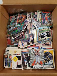 lot 16023 image: Large Lot of Sports Cards.  BASEBALL BASKETBALL FOOTBALL. Some ROOKIES. Many SLEEVED. Recent and Oldies.