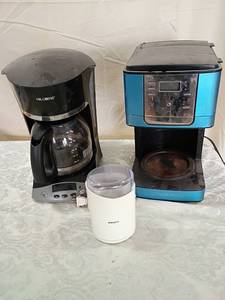 lot 24 image: Mr. Coffee 12-Cup Programmable Coffee Maker - BlueBlack and coffee grinder