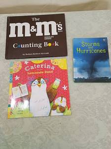 lot 43 image: Childrens Book Bundle - M&Ms Counting, Storms, and Caterina