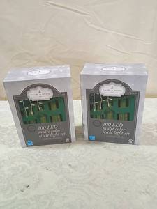 lot 64 image: Trim A Home 100 LED Multi-Color Icicle Light Set