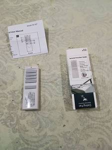 lot 72 image: Ceiling Fan Remote Control RC-92T with Wall Dock