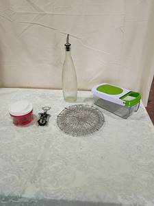 lot 75 image: Manual Food Chopper with Red Base, steamer, wine bottle opener, glass dispenser, and vegetable chopper