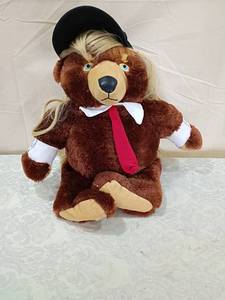 lot 91 image: Patriotic Teddy Bear with American Flag Cape and blonde wig hat