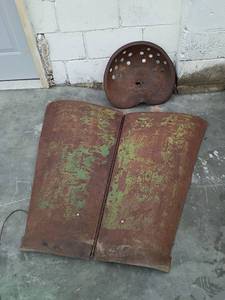 lot 106 image: Metal Tractor Seat and hood
