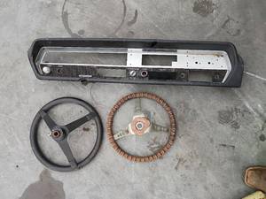 lot 109 image: 1960s Oldsmobile Dashboard and 2 Steering Wheel Set