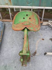 lot 110 image: John Deere Tractor Seat Assembly old heavy tractor seat