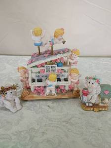 lot 146 image: Decorative Musical Piano with Cherubs and Roses