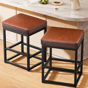 lot 15640 image: Counter Height Bar Stools Set of 2, 24 Barstools for Kitchen Countertop, Faux Leather Counter Stools with Thick Square Seats & Sturdy Metal Base, Simple Assembly, Brown - Retail $139