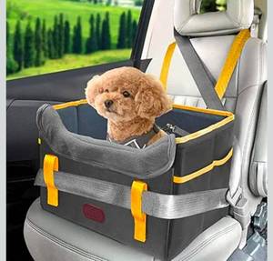 lot 15896 image: Dog Car Seat for Small Dogs, Fuzzy Dog Car Seat Up to 25lbs Stable, Waterproof, Foldable with Clip-On Safety Leash, Pet Booster Seat Suitable for Front and Rear Seats - Retail $0