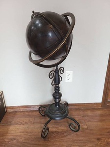 Decorative standing globe with leather-like surface 34 in tall