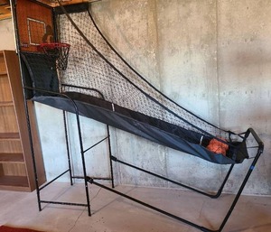 Basketball Return System with Net and Balls, approx 7.5ft tall and 7ft long, located in basement