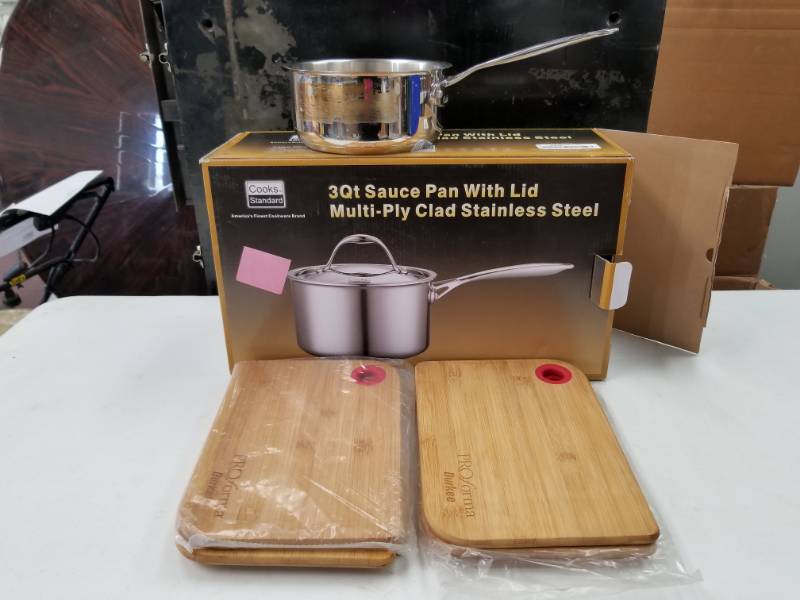 lot 10032 image: Pans and cutting boards lot