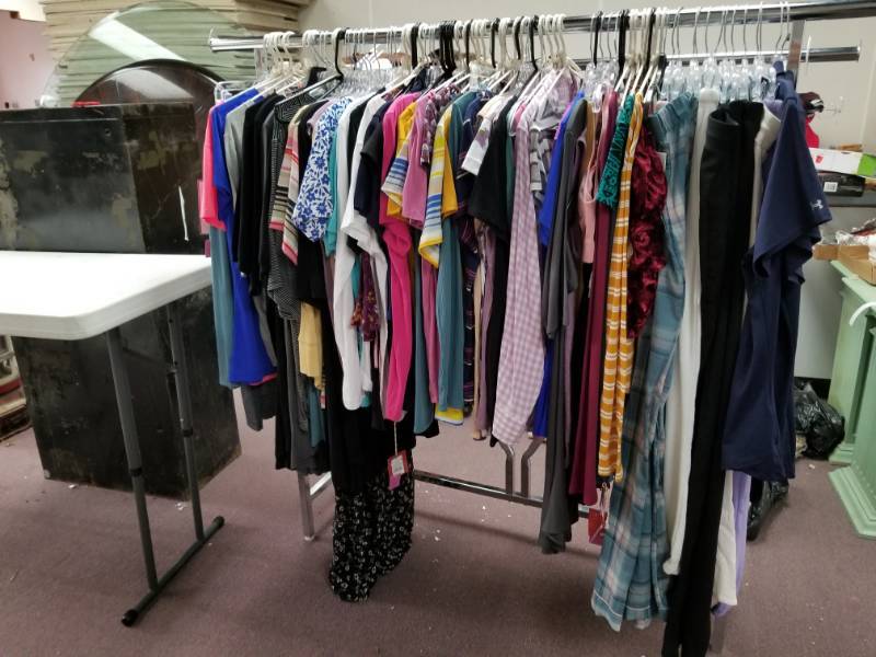 lot 10323 image: Huge Lot of Clothing Rack not included