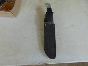 lot 3343 image: Buck Knife in Sheath