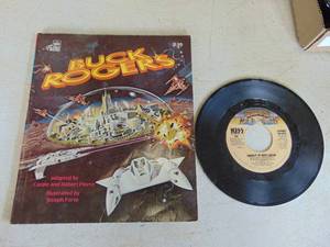 lot 3350 image: Kiss and Buck Rogers