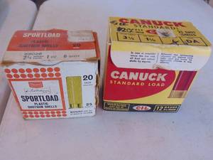lot 3411 image: Empty Canucks Box and box of 20 ga. shells