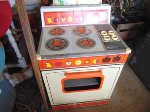lot 3494 image: Metal Woverine Childrens Stove