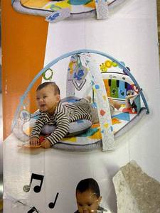 lot 191688 image: Baby Einstein 4-in-1 Kickin Tunes Music and Language Play Gym and Piano Tummy Time Activity Mat