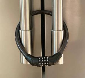 lot 26145 image: Urban August Refrigerator Lock for Kids & Adults, 4-Digit Code Fridge Lock for French-Door Refrigerators, & Versatile Cabinet (One) - Retail $9