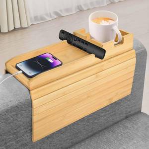 lot 26209 image: Bamboo Couch Arm Tray with Built-in Cup Holder, Foldable Anti-Slip Sofa Armrest Tray Table Caddy for Drinks, Phone & Remote, Fits 4.7x16.9 in Armrests, Holds Up to 3.5 in Diameter Cups (Bamboo). CORNER has a Crack. - Retail $25