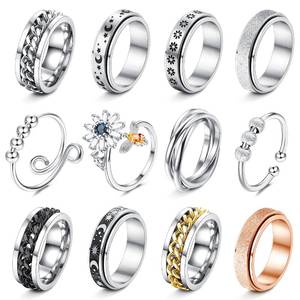 lot 1174 image: FASACCO 12Pcs Fidget Anxiety Rings for Women Men - Spinner Fidget Rings for Anxiety Relieving Stress Flower Moon Star Stainless Steel Rings Adjustable Size 8