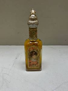 lot 336 image: Avon 90th Anniversary Amber Glass Bottle