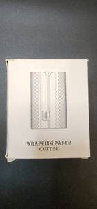 lot 70626 image: Turquoise Wrapping Paper Cutter Tool - Retail $12