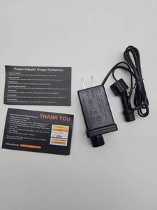 lot 69377 image: AC Power Adapter with Usage Guidelines - Retail $12