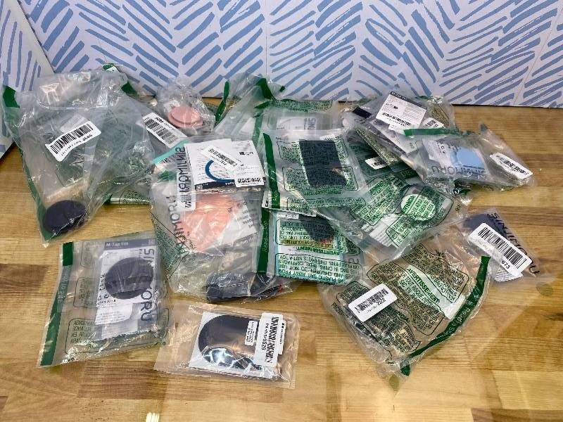 lot 191643 image: Mystery Box of Miscellaneous Phone Accessories