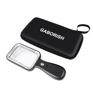 lot 16952 image: 10X Magnifying Glass with Light and Case, Rechargeable Magnifier with 3 Color Modes, Lighted Magnifying Glass Handheld for Seniors Reading Low Vision, Inspection, Close Work - Retail $25