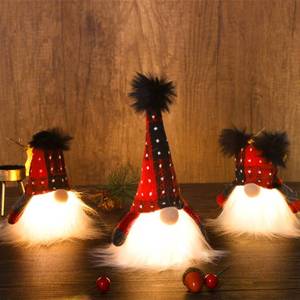 lot 16965 image: Juegoal 3 Pack Lighted Christmas Gnome, Handmade Mini Scandinavian Swedish Tomte, Battery Operated Winter Tabletop Christmas Decorations - Retail $15,057