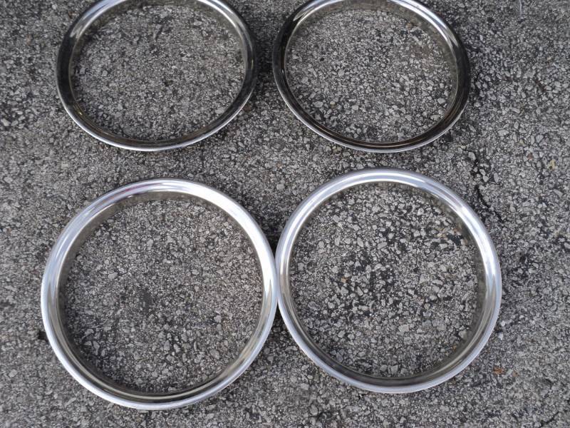 lot 3600 image: (4) ct. lot metal rim covers, 14 ID