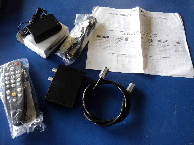 lot 3674 image: Replacement Digital Transport Adapter for Comcast Xfinity includesDigital Transport adapter, 3 coax cable, remote, remote control sensor receiver, power cord