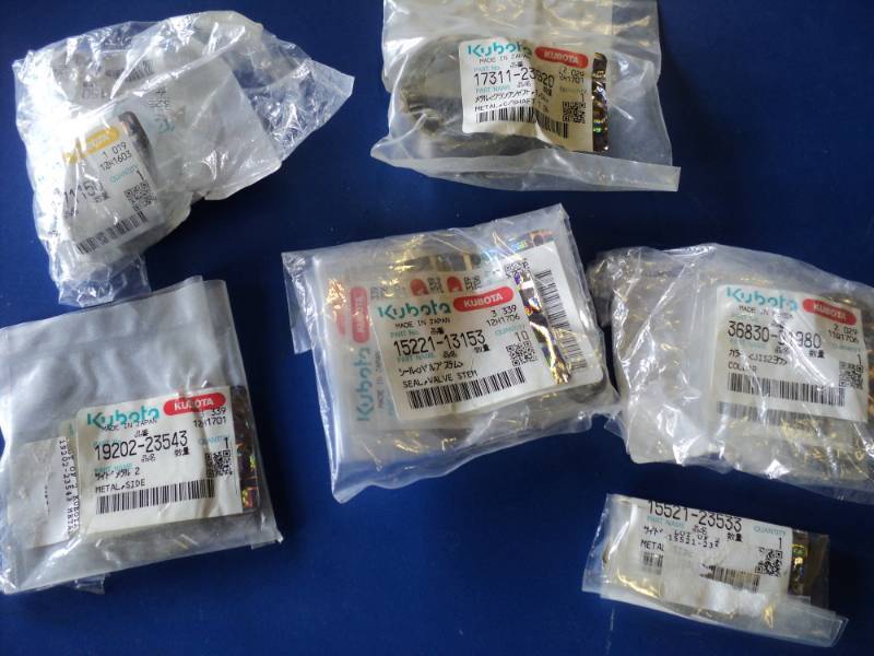 lot 3684 image: Mixed lot of Kubota part seals collars, shaft, packaged for resale