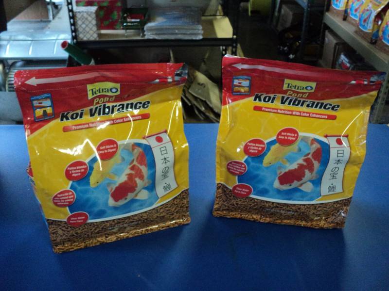 lot 3702 image: (2) bags Tetra Pond Koi Vibrance 2.42 lb. bags