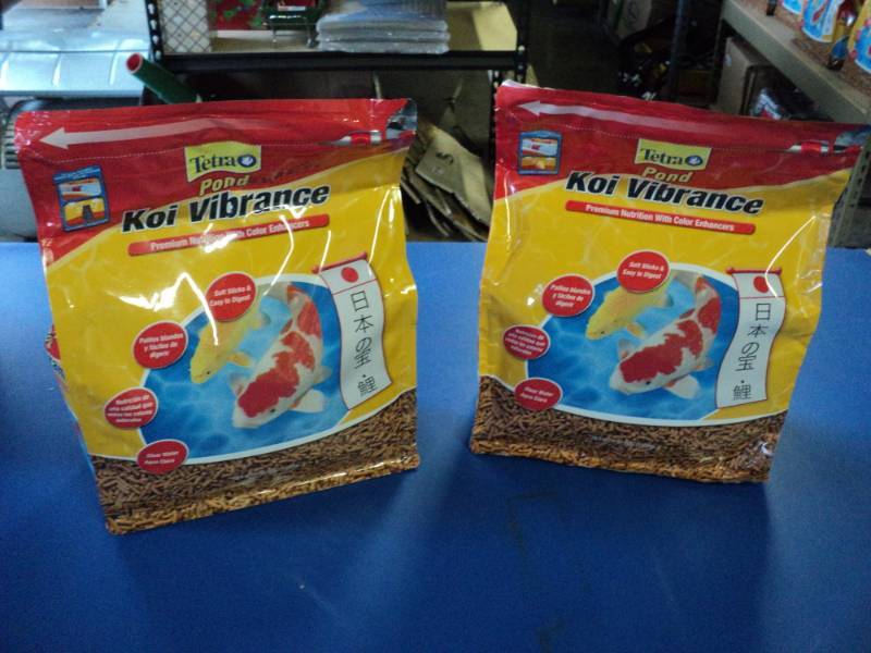 lot 3704 image: (2) bags Tetra Pond Koi Vibrance 2.42 lb. bags