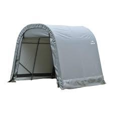 lot 3539 image: shed Logic temporary structure,  most of the parts for 8 X 8 X 8 shed, missing pieces,  please inspect.
