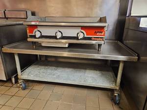 lot 15587 image: APW Wyott Champion Commercial Griddle W Rolling Table
