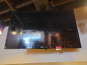 lot 15611 image: Haier Flat Screen TV - Approx 52in
