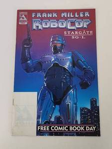 lot 213 image: Frank Miller RoboCop Stargate SG-1 Free Comic Book Day