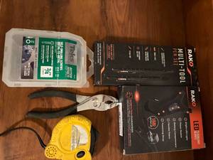 lot 1084 image: Multi Tool Pen Set, Screws, Measuring Tape, Pliers, Flashlight & Gloves-- BR2