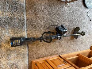 lot 1099 image: Kobalt 80V Max Weed Trimmer Battery & Charger-- FR