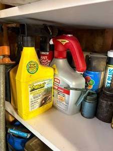 lot 1165 image: Contents of Top Shelf #2 (gloves, bug spray, paint, caulking)-- WW