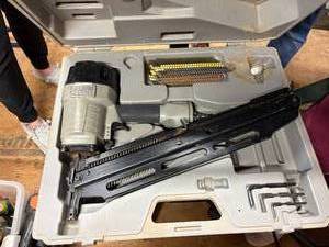lot 1199 image: Porter Table Nail Gun Framer-- CS