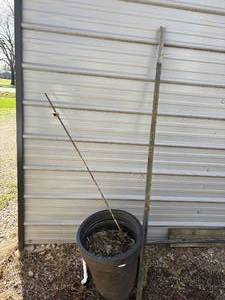 lot 1265 image: Big Planter, Fence Post & Electric Post-- Behind CP