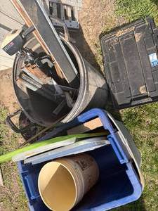 lot 1294 image: Totes, Trolling Moter, Pipes & Trash Can-- Outside S
